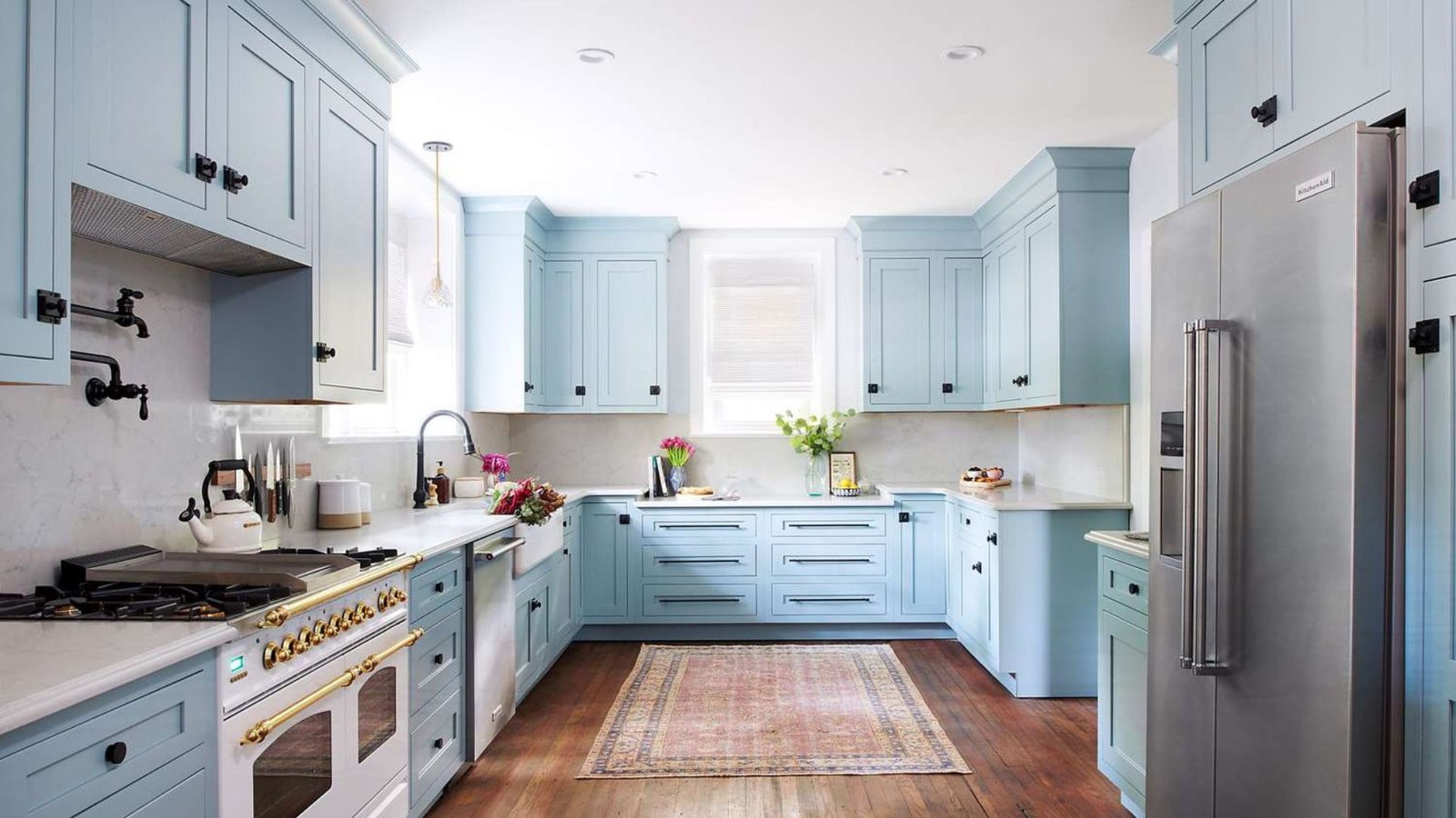 A Kitchen with Blue Cupboards