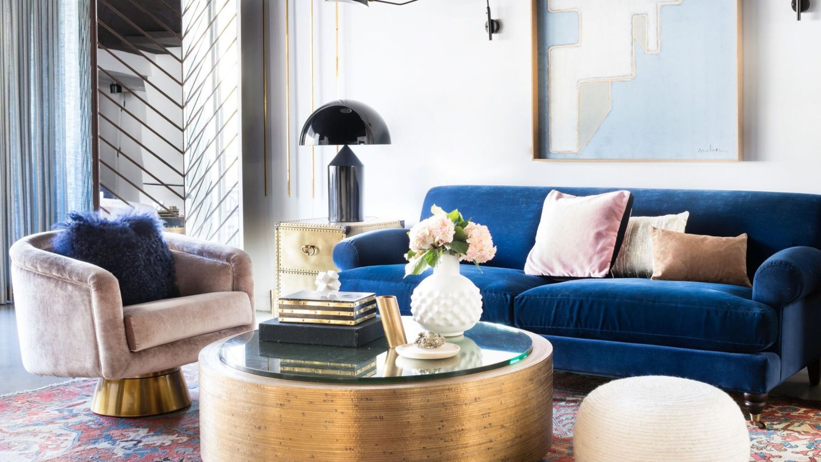 Blue velvet sofa gold drum coffee table
